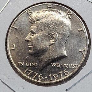 1976 Ike Dollar, Kennedy Half and Quarter.. Uncirculated.. In Protective Sleeves